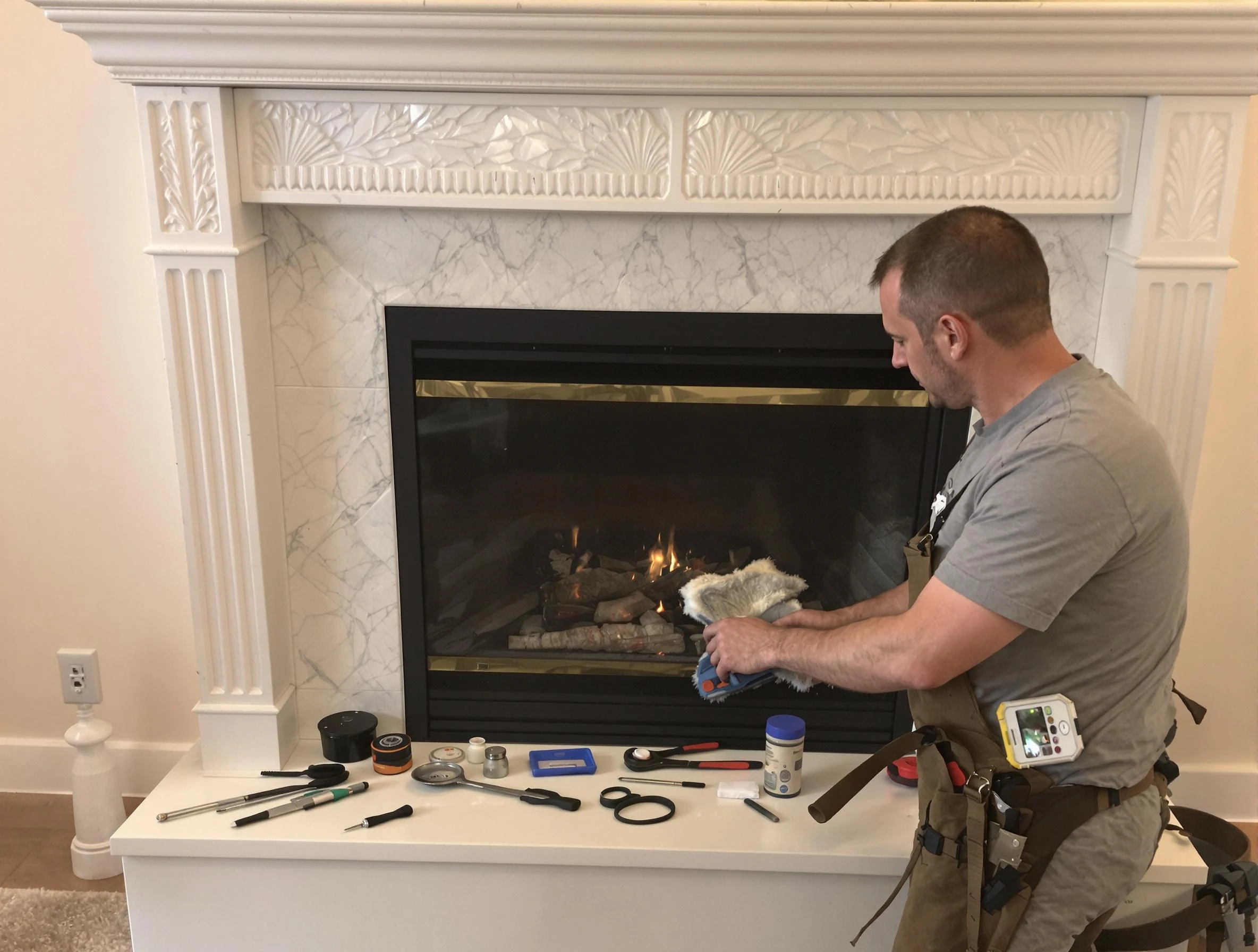 Jonesboro Chimney Sweep performing fireplace maintenance in Jonesboro, GA